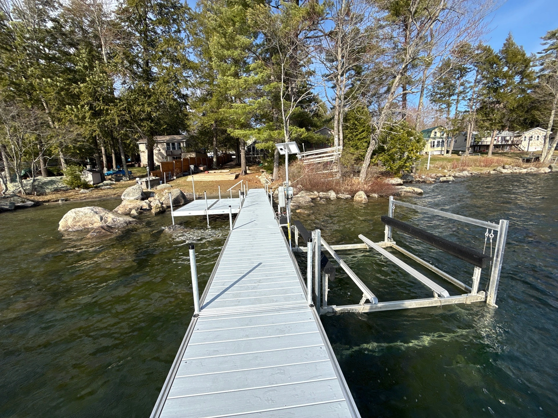 Wooden dock system extending into the water