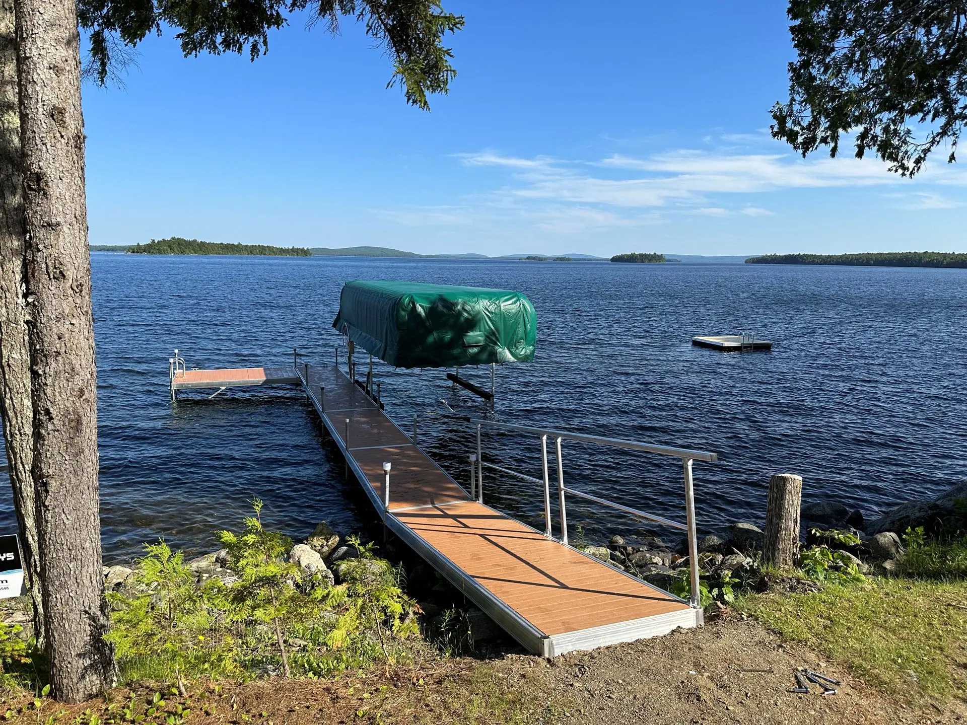 Wooden dock system extending into the water